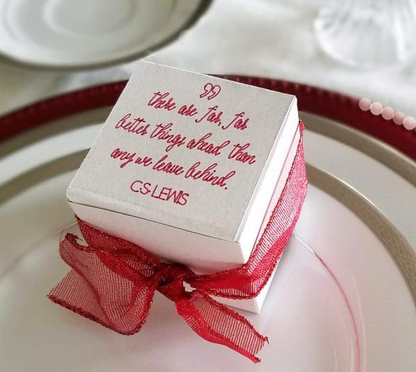 A plate with some cake sitting on top of a table