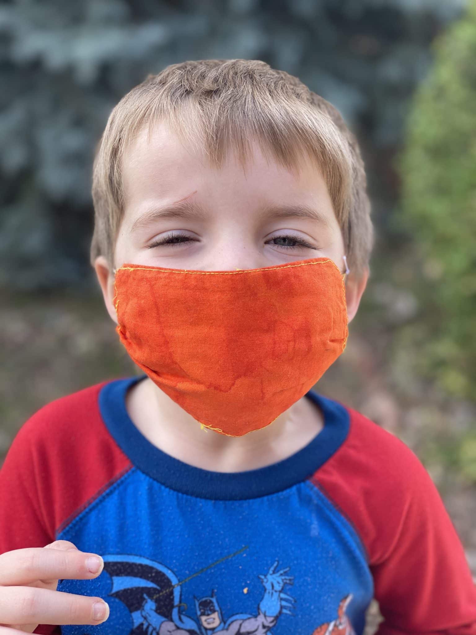 little boy with face mask