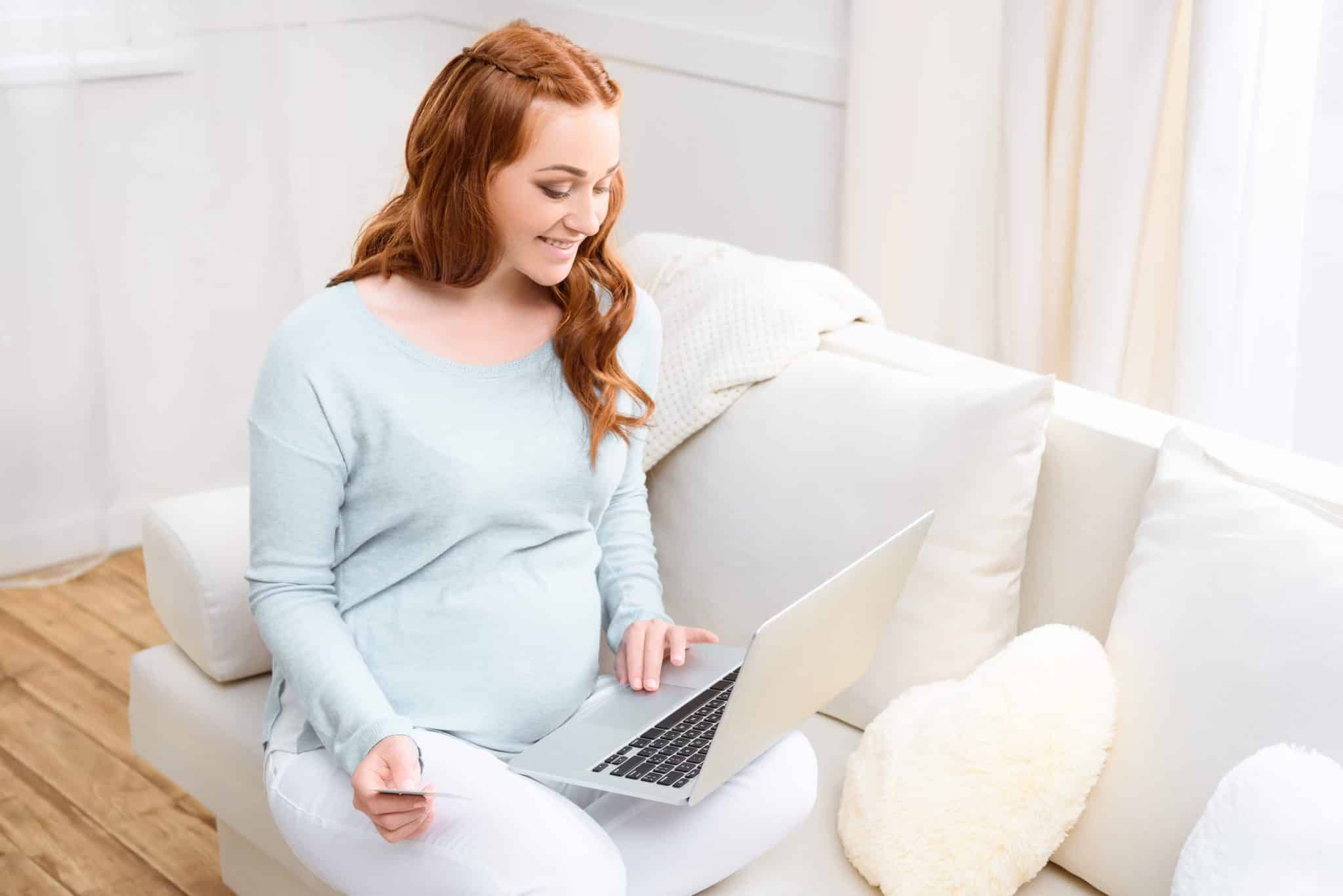 A woman sitting on a bed